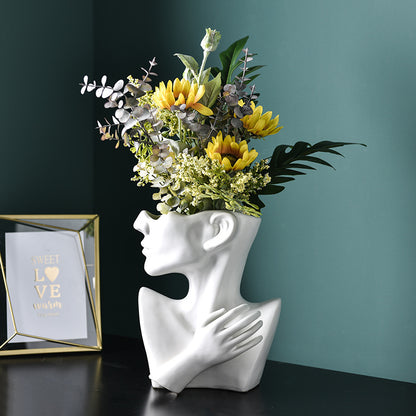 Decorative ceramic portrait vase with minimalist design
