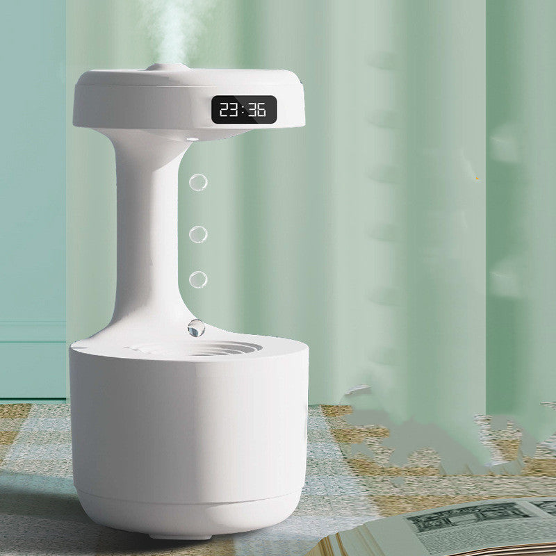White humidifier with digital display on a checkered tablecloth