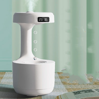 White humidifier with digital display on a checkered tablecloth