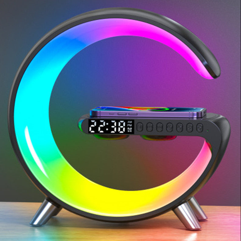 Colorful LED lamp with digital clock and phone stand on a gradient background